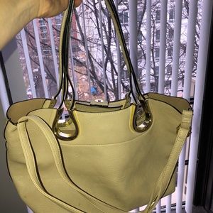 Great purse with travel strap.